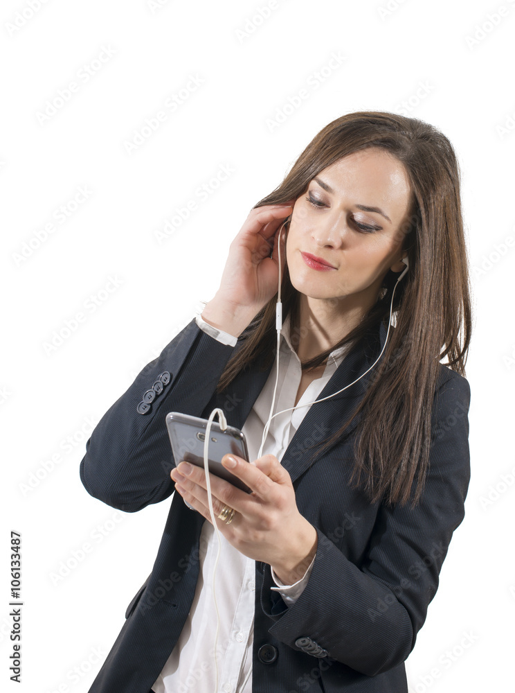 Closeup portrait of lovely young woman enjoying music using headphones, isolated over white Closeup portrait of lovely young woman enjoying music using headphones, isolated over white