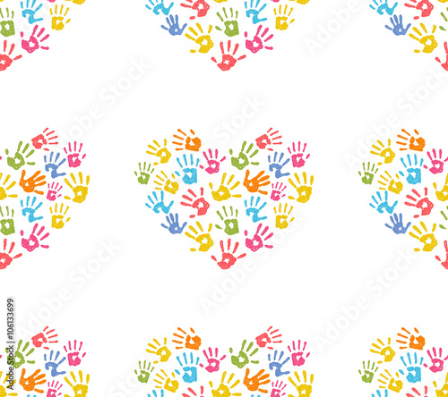 Seamless pattern with hand prints in a shape of heart