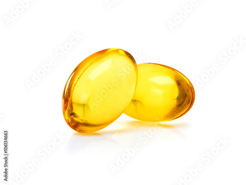 Fish oil supplement capsule isolated on white background photo