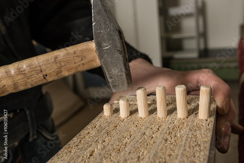 фотографія Many wooden dowel pins