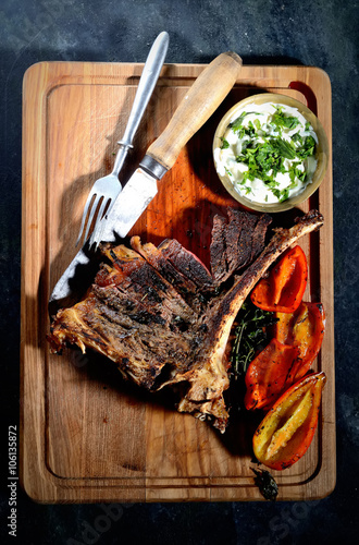 grilled steak on the wooden background