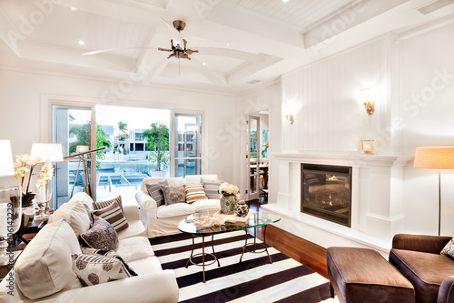 Beautiful sofa set with a glass table in the center photo