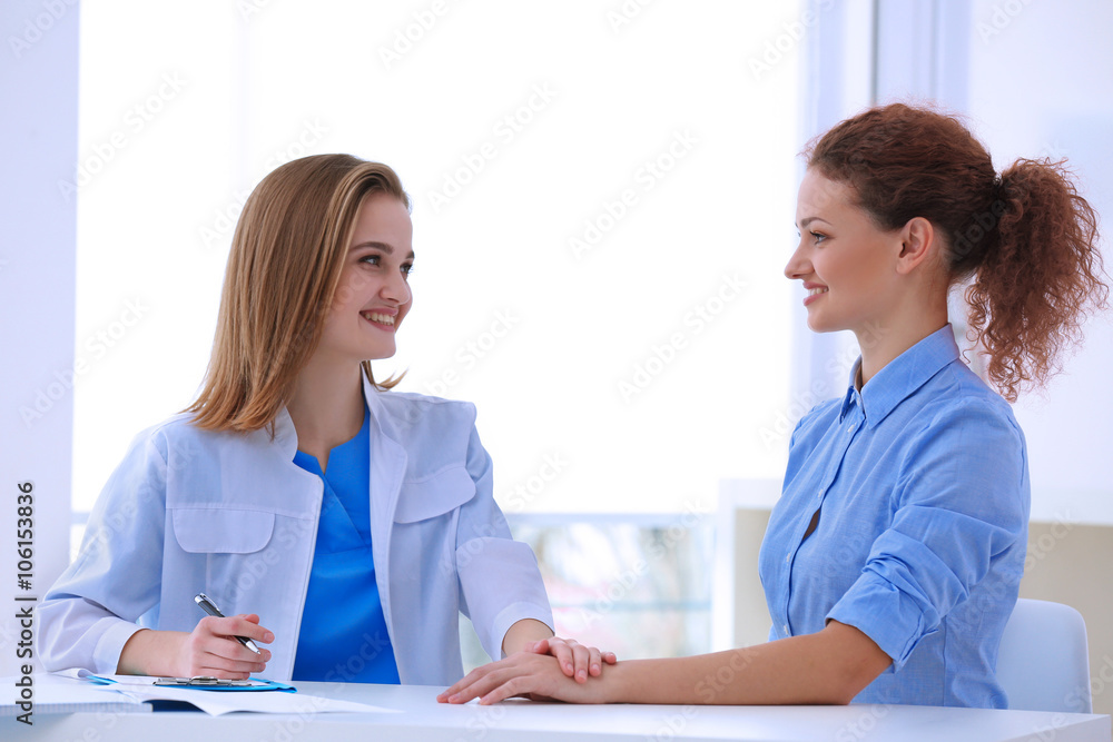 Doctor and patient in office Doctor and patient in office