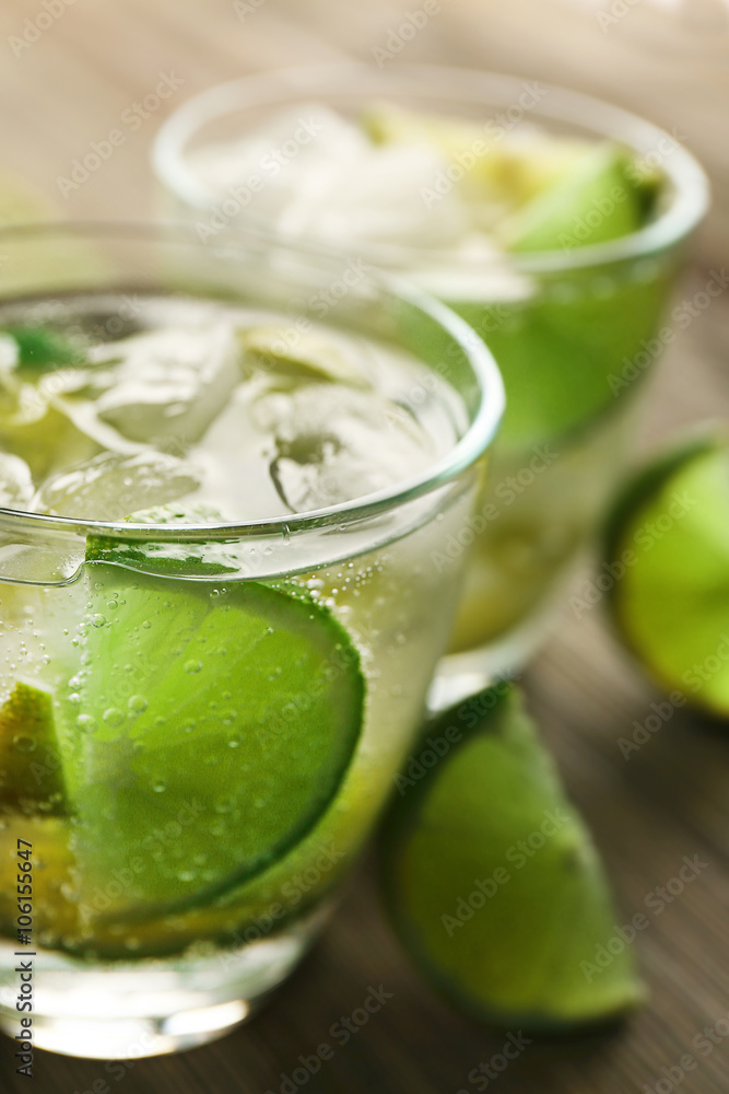 Mojito drink with lime, closeup Mojito drink with lime, closeup