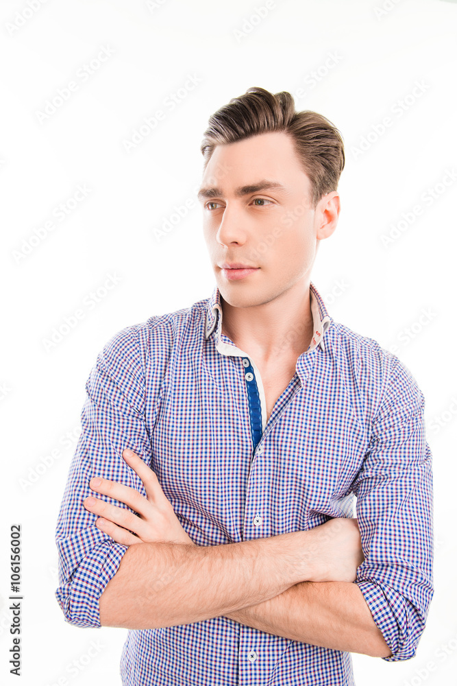 Portrait of serious handsome minded man with crossed hands Portrait of serious handsome minded man with crossed hands