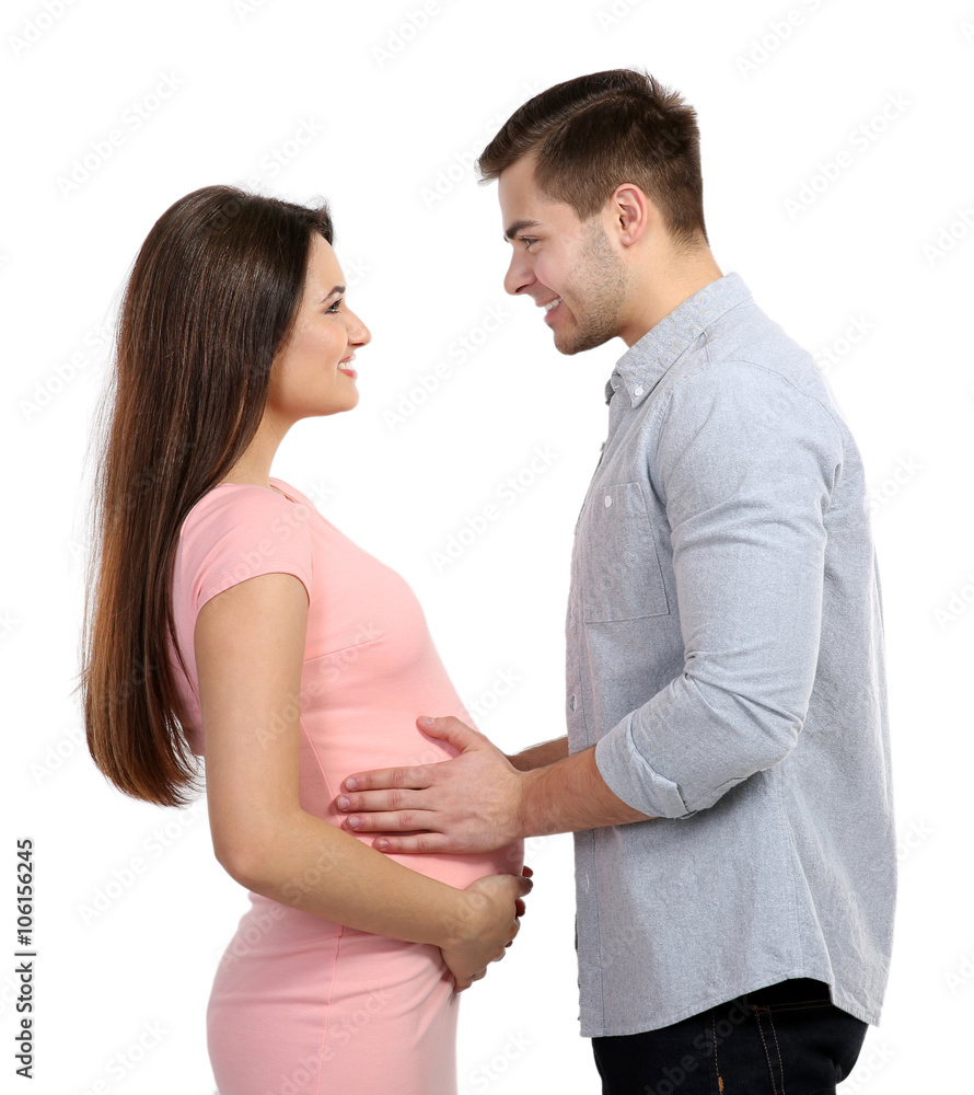 Young pregnant woman with husband isolated on white Young pregnant woman with husband isolated on white