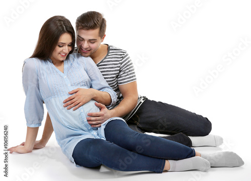 Young pregnant woman sittin...