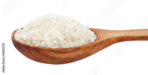 Rice in wooden spoon isolated on white