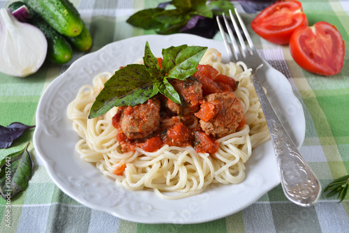 Spaghetti with tomato sauce and meatballs