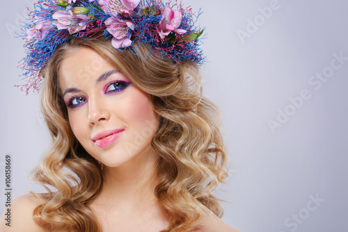 Beautiful young woman in wreath