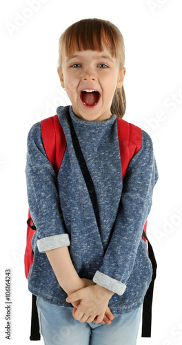 Schoolgirl with backpack is...