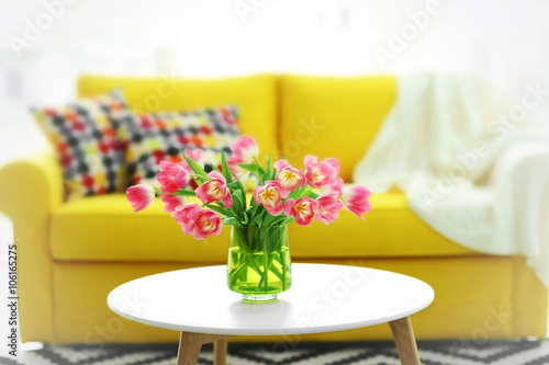 Fresh bouquet of tulips on a coffee table © Africa Studio