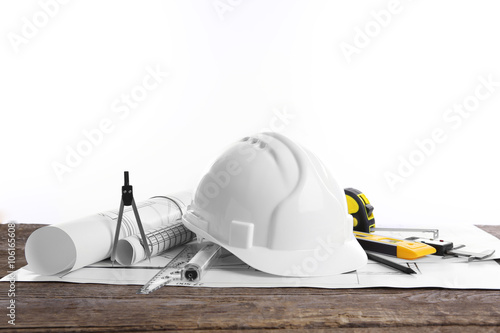 Yellow helmet and blueprint...
