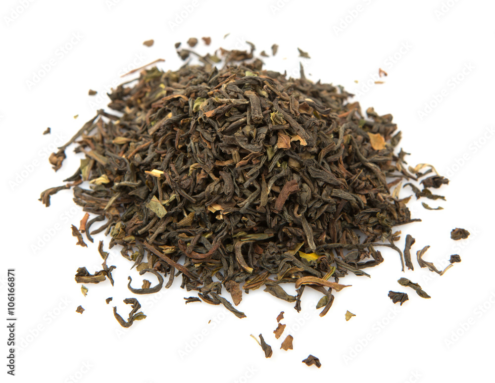 Loose dried darjeeling black tea leaves over white background Loose dried darjeeling black tea leaves over white background