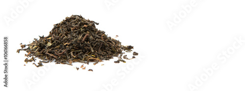 Loose dried darjeeling black tea leaves over white background