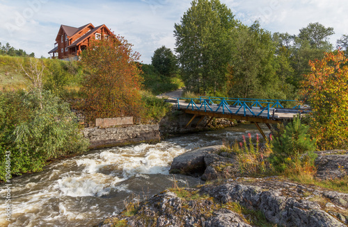 Summer landscape on a stormy river full of rapids in Karelia on Ladoga. Asilansky rapids on the river Asilanyoki