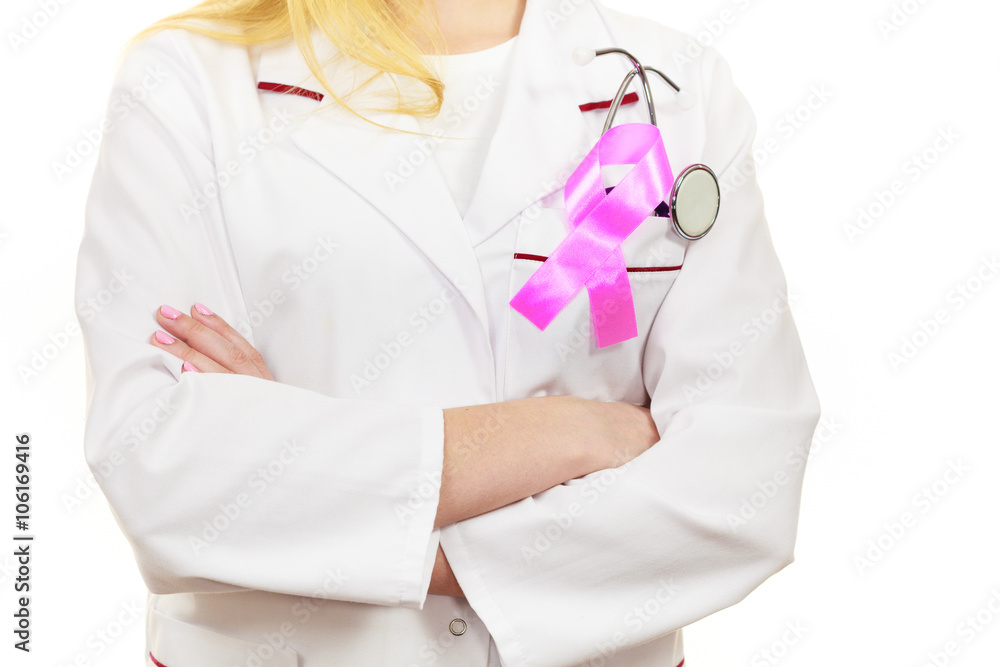 Doctor with pink cancer ribbon aids symbol on chest Doctor with pink cancer ribbon aids symbol on chest