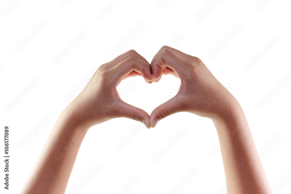 Fototapeta premium Female hands in the form of heart isolated on white background