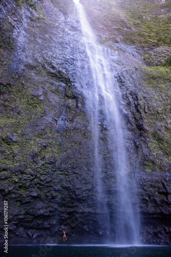 A swimmer at hanakapiai falls photo