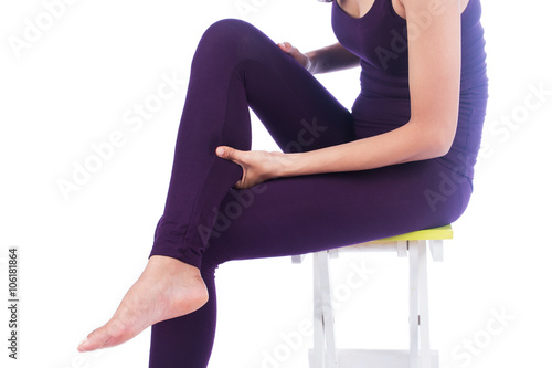 young women calf pain on white background photo