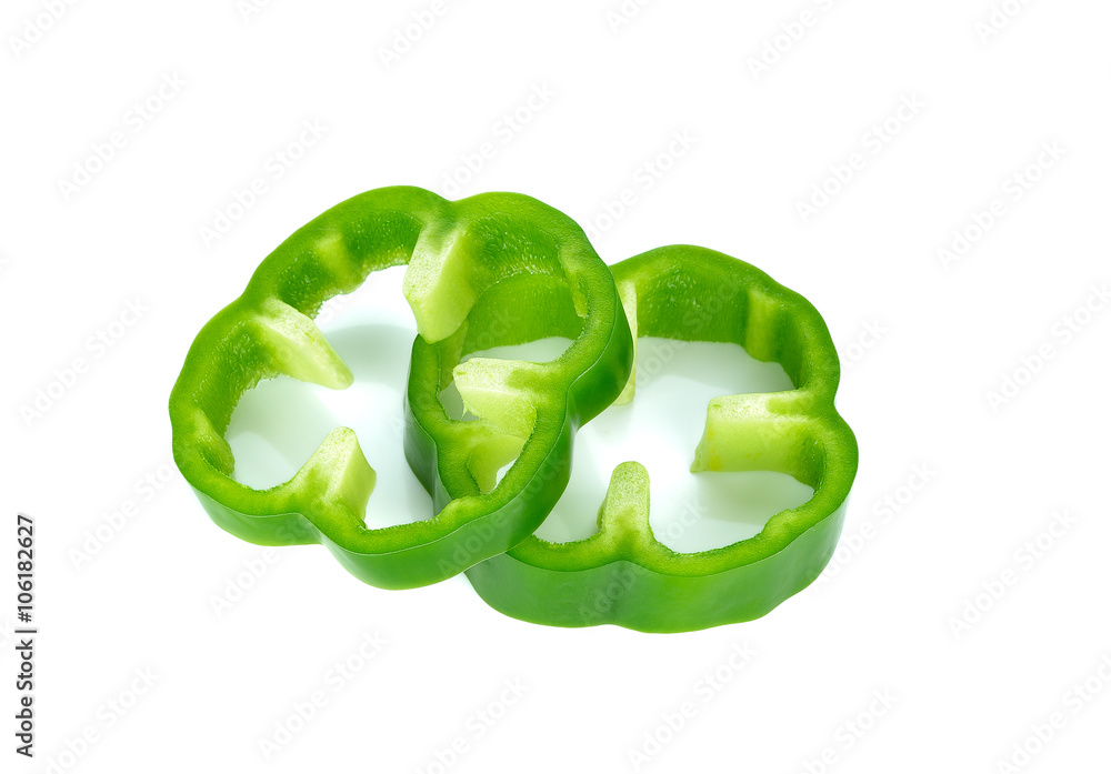Sliced Green Peppers arranged on white background Sliced Green Peppers arranged on white background