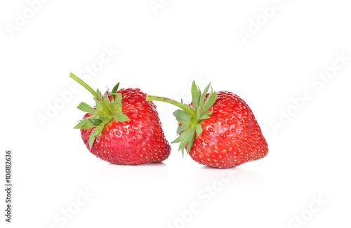 Two strawberries on white background