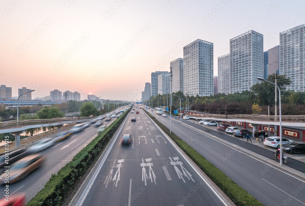 traffic on road and modern buildings in beijing