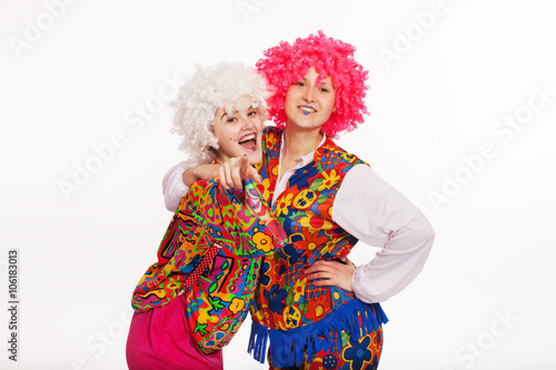 Funny Clowns in bright costumes