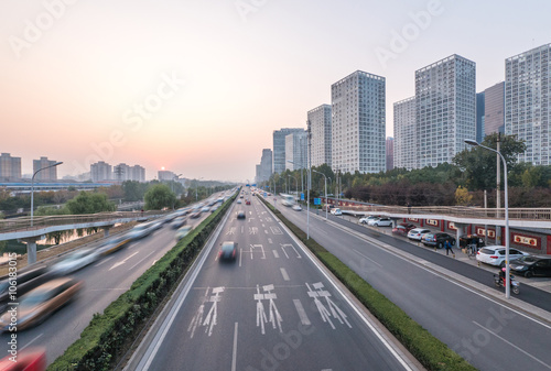 traffic on road and modern buildings in beijing © zhu difeng