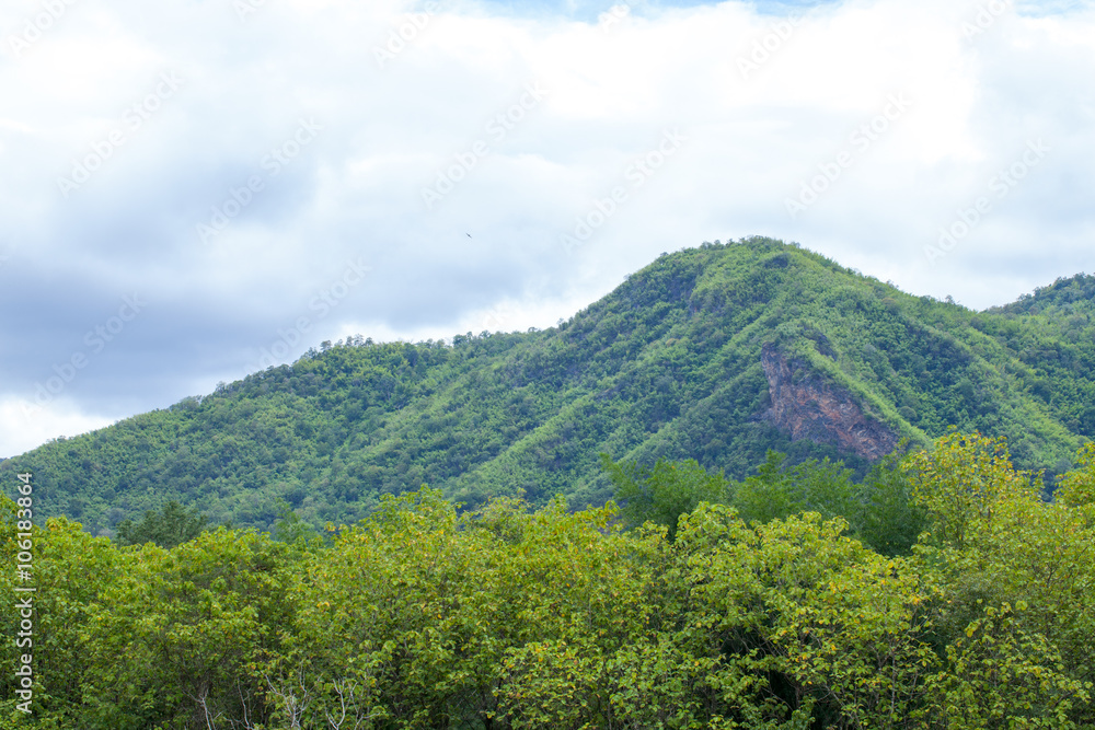 green mountain and cloud, scenic of cloudy sky with mountain hill and green forest in Thailand green mountain and cloud, scenic of cloudy sky with mountain hill and green forest in Thailand