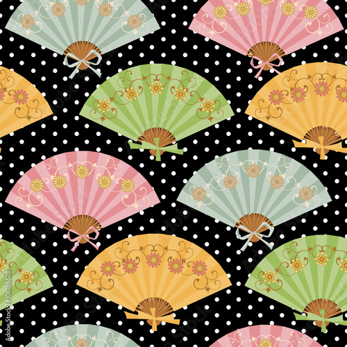 Multi-colored fan with flower pattern in Oriental style.