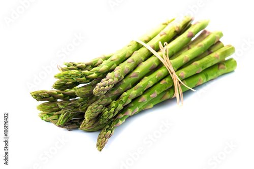Fresh green asparagus  isolated on white background photo
