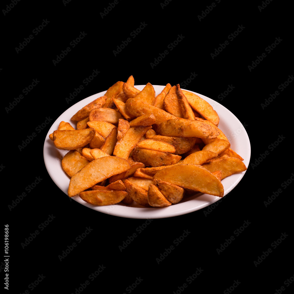 Fried potatoes on black