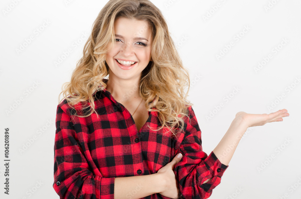 Smiling woman showing open hand palm with copy space for product or text Smiling woman showing open hand palm with copy space for product or text