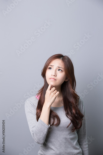 unhappy woman think something