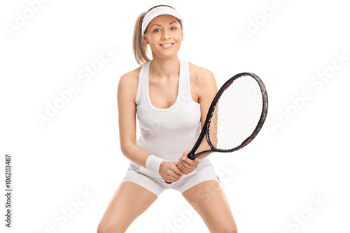 Female tennis player posing with a racket © Ljupco Smokovski