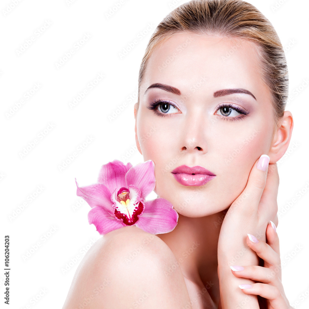 face of a woman with purple eye makeup and lips face of a woman with purple eye makeup and lips