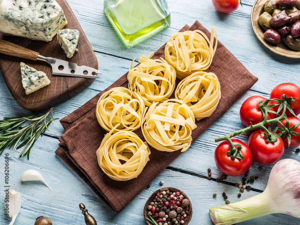 Tomatoes, spaghetti pasta and spices. Tomatoes, spaghetti pasta and spices.