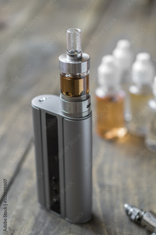 e-cigarettes with lots of different re-fill bottles e-cigarettes with lots of different re-fill bottles