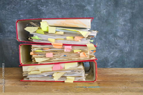stack of messy file folders and documents,free copy space photo