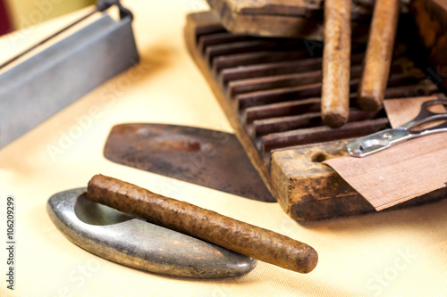 cuban Cigars with wooden box, and tools for cigar preparation