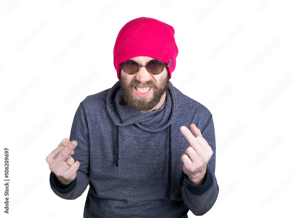 Naklejka premium Handsome young bearded hipster in pink knitted hat expresses various emotions and shows different signs the fingers. isolated on white background