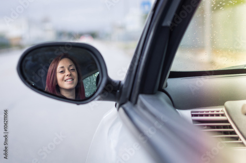 Attractive young caucasian girl driving a car  © Davide Angelini