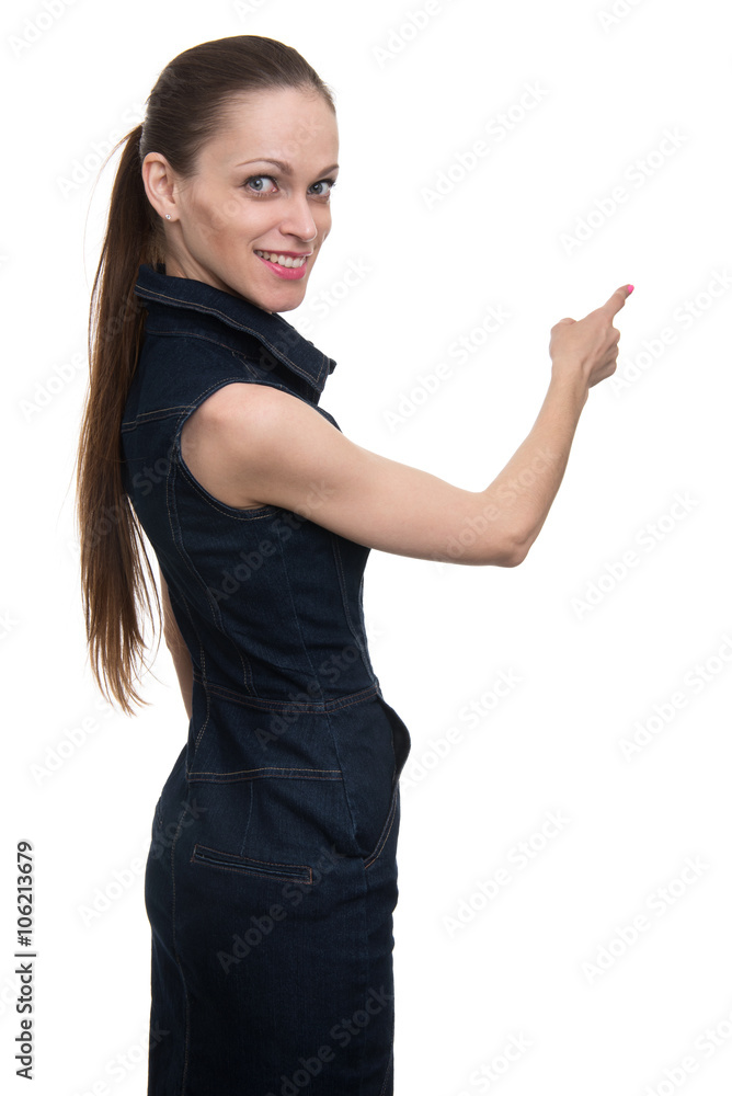 Young elegant woman pointing at copy space Young elegant woman pointing at copy space