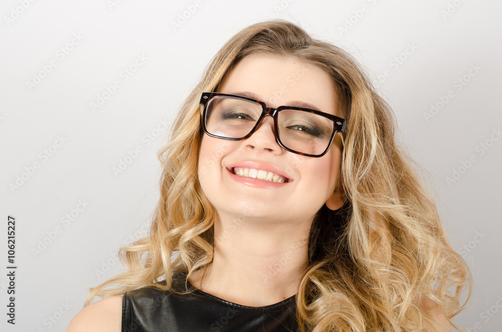 Portrait of happy attractive fashionable young woman