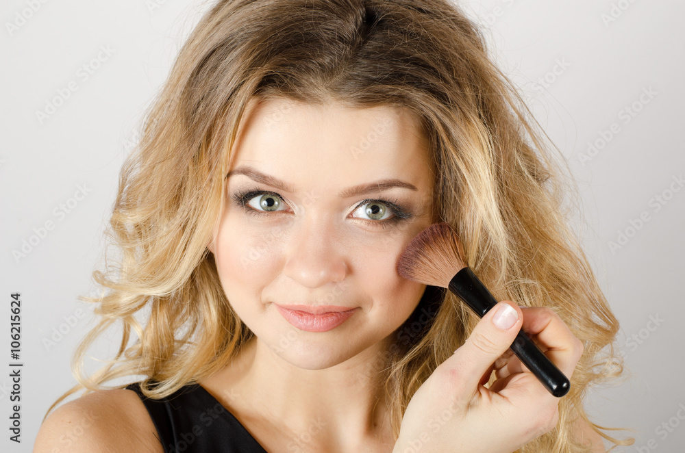 Glamour portrait of beautiful woman model with fresh daily makeup and romantic wavy hairstyle Glamour portrait of beautiful woman model with fresh daily makeup and romantic wavy hairstyle