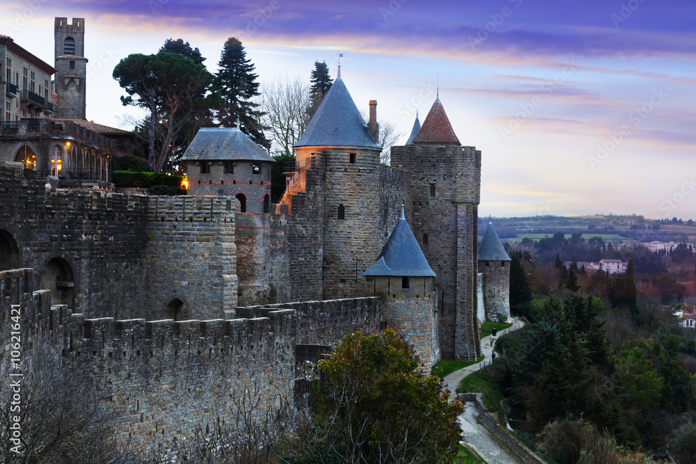  Medieval  fortness walls in evening.  Carcassonne