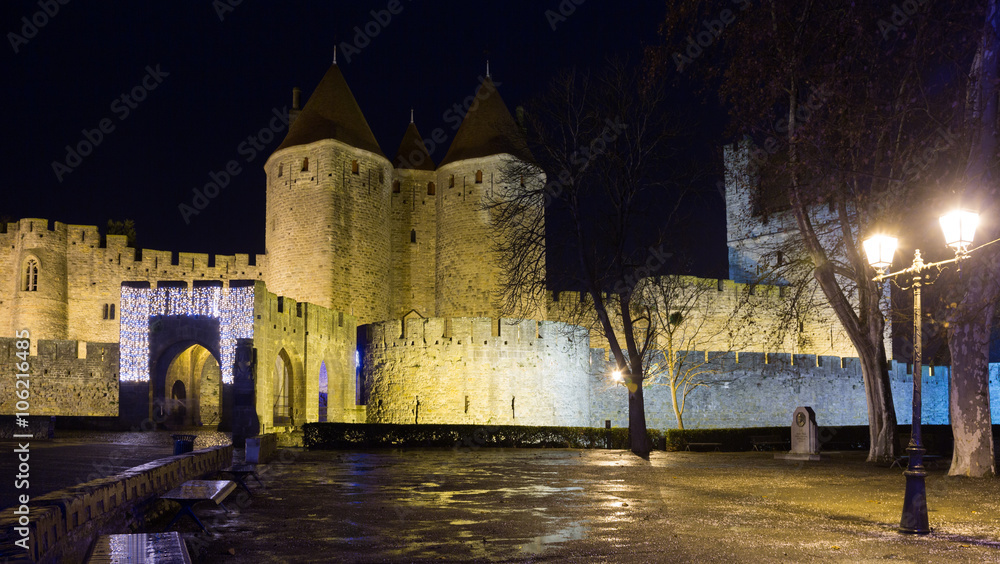 Gate of fortified city in night.  Carcassonne