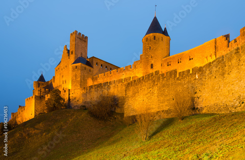castle and fortified city in evening time. Carcassonne