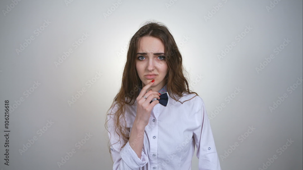 Different emotions of girl over the grey wall. RAW video record. Different emotions of girl over the grey wall. RAW video record.